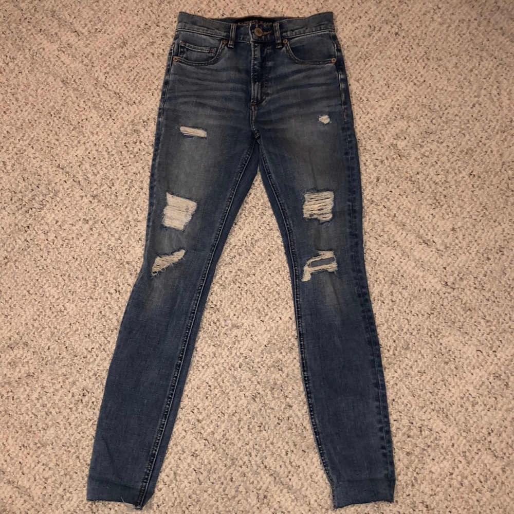 Express skinny jeans with distressing